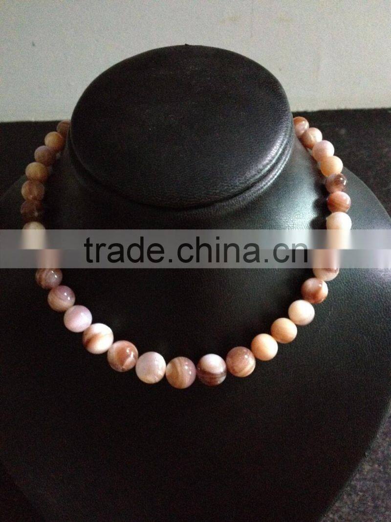 drilled American pink shell beads