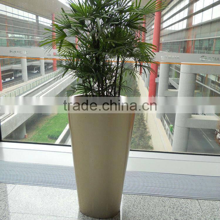 Gold fiberglass planter