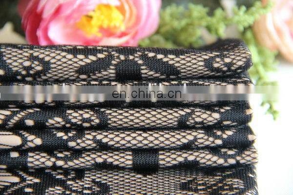 Knit polyester with flower pattern lace coated