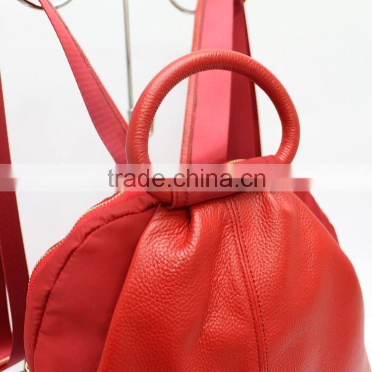 The new red embossed leather casual backpack, Wemen handbags