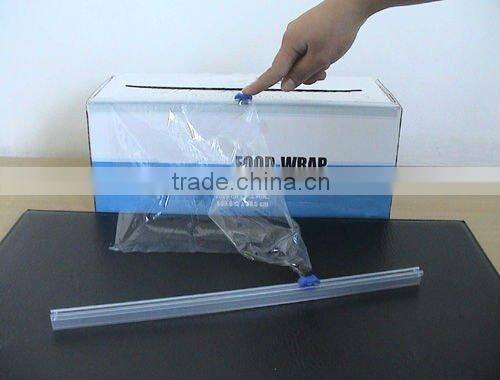 Plastic slide cutter for cling film - push-on type