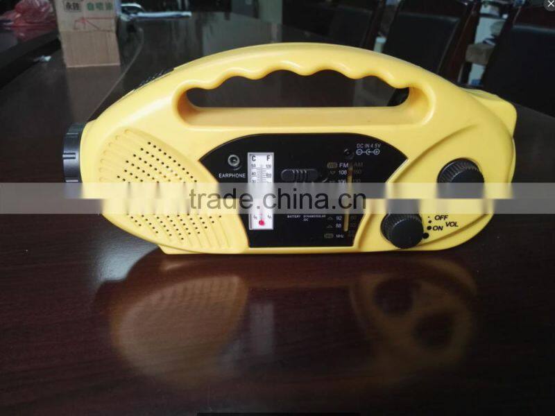 solar dynamo radio with LED torch and cell phone charger and thermometer