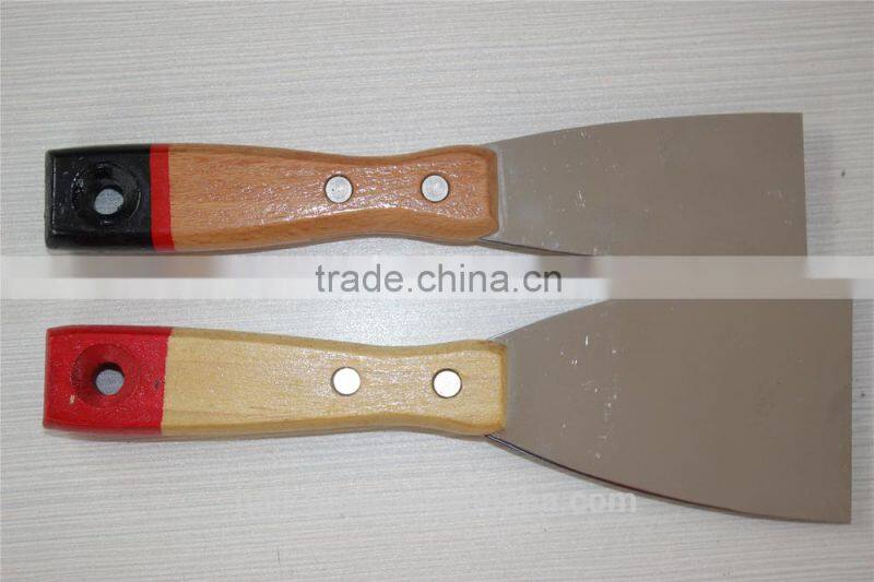 Long wooden handle putty knife / construction tools