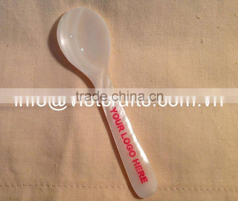 Mother of pearl caviar spoon, logo engrave, pink logo color