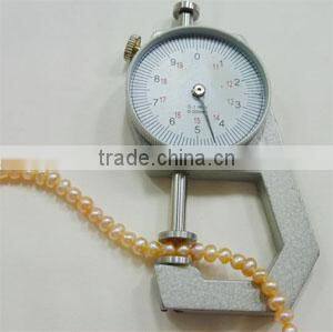 Pearl, cultured freshwater(dyed) ,yellow ,4-5mm potato,C grade, Mohs hardness 2-1/2 to 4. Sold per pkg of (25) 15-inch strands