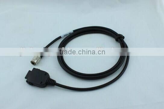 Data cable connects Pentax Total Station with HP/PDA