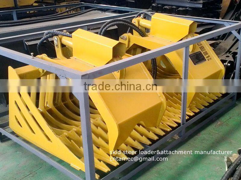 skid steer loader with rock grapple