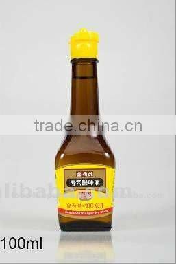 Seasoned sushi vinegar in glass bottle