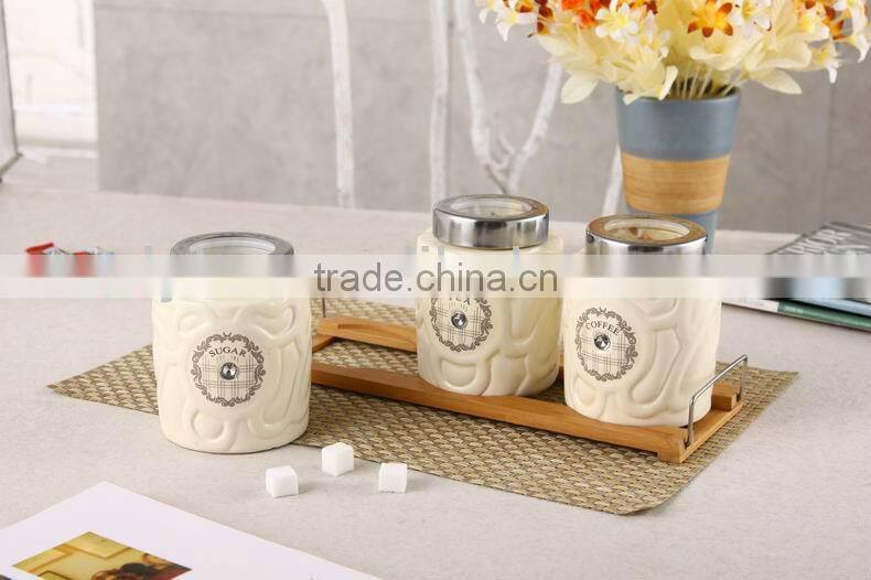 3pcs ceramic canister set with embossed design & bamboo stand