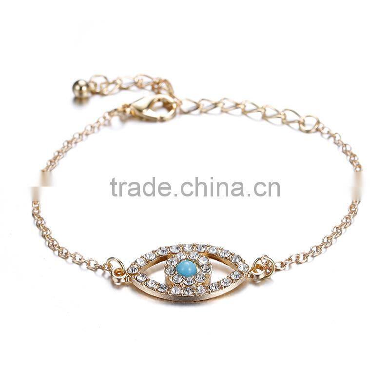 rhinestone evil eye charm gold chain bracelet