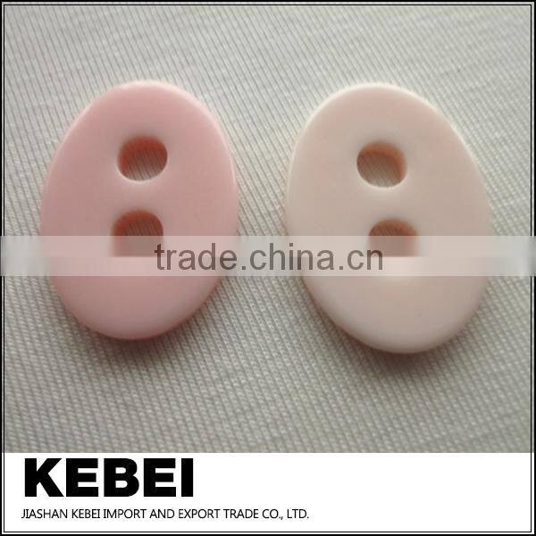 Oval shape resin pearl buttons two hohe decorative buttons with high quality