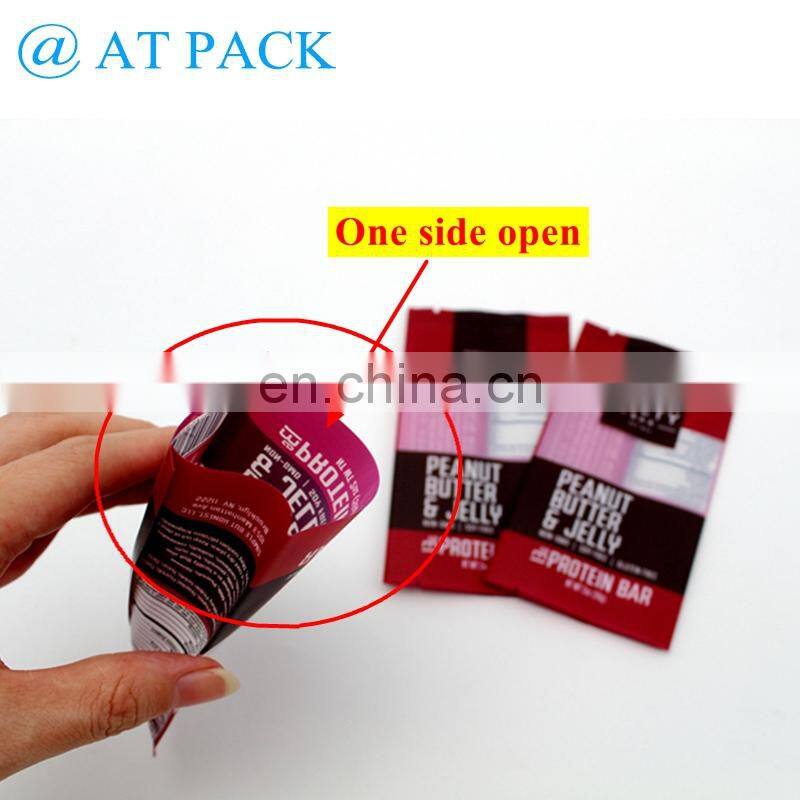 Custom printed back side seal heat sealable candy bar wrapper