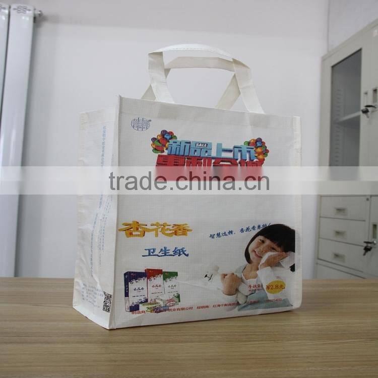 linyi warp and weft paper material logo printed private ordering packaging material / branded paper bag / handle paper bag