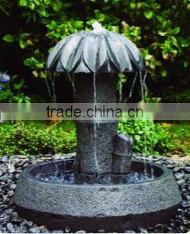 small stone carving animal figure stone fontain restaurant water feature