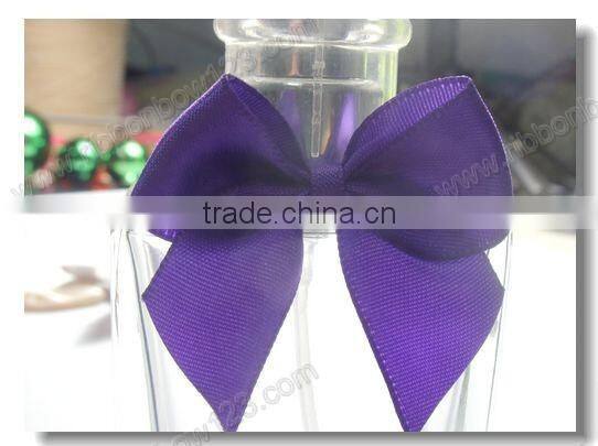 designs of ribbon flowers for perfume bottle
