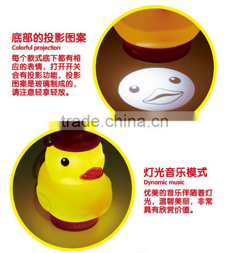 2016 new item funny cartoon projection toy lantern for children with music and 7 colors flashing light