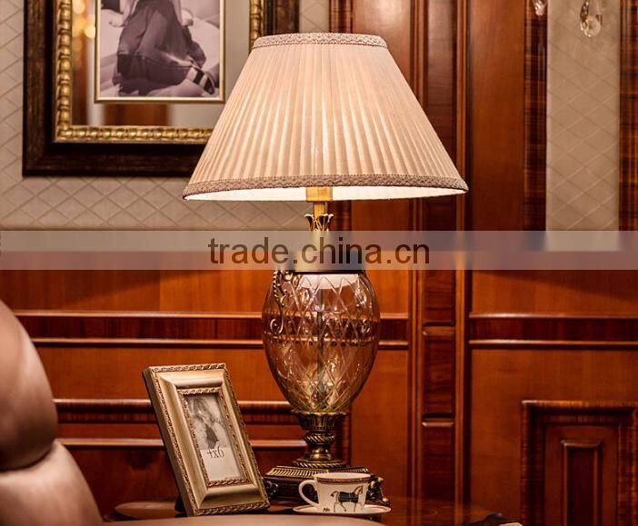 Olivary design clear glass body metal bottom fabric lampshade table lamp