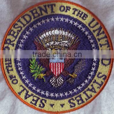 simple design round shape 100% custom embroidery patches from China factory