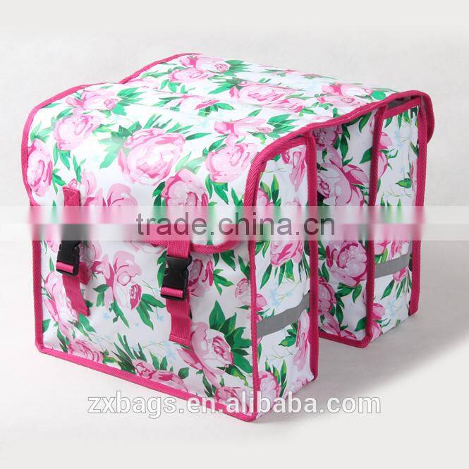 beautiful rose blossom pannier bike