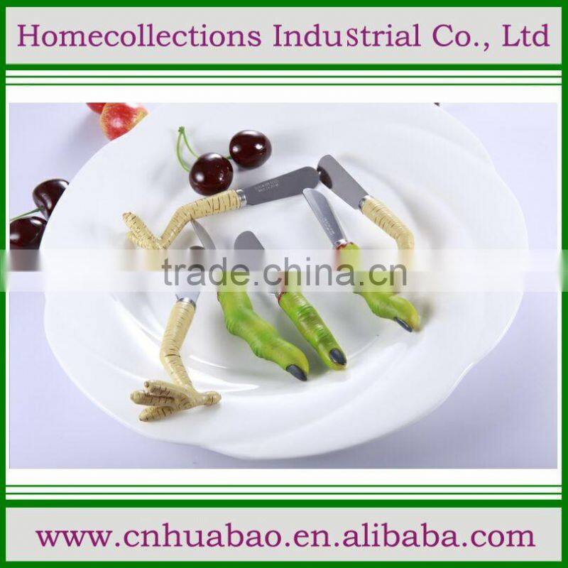 Top quality custom chicken feet shaped polyresin handle butter knife set, cheese spreaders