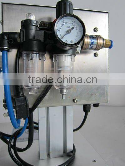 Semi-automatic spray head capping machine