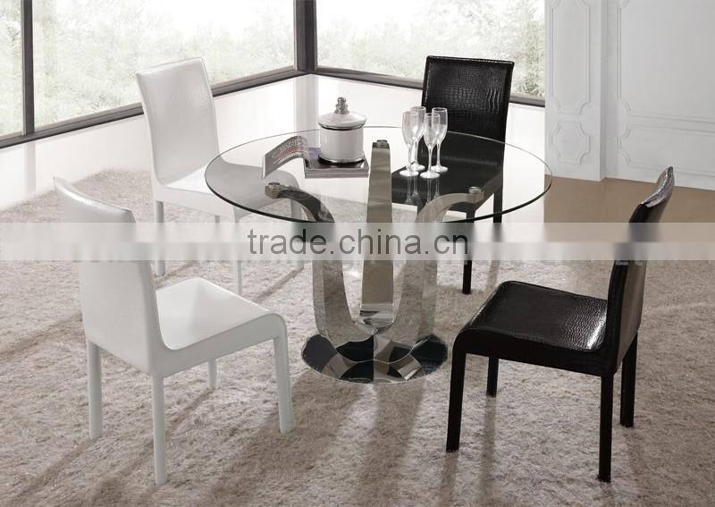 simple design dining table with clear glass top
