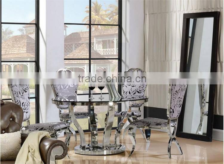 Promotion factory price stainless steel restaurant table with glass top/round dining table with chairs