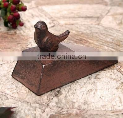 The cast iron mouse door stop