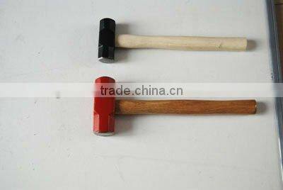 Sledge hammer with wooden handle