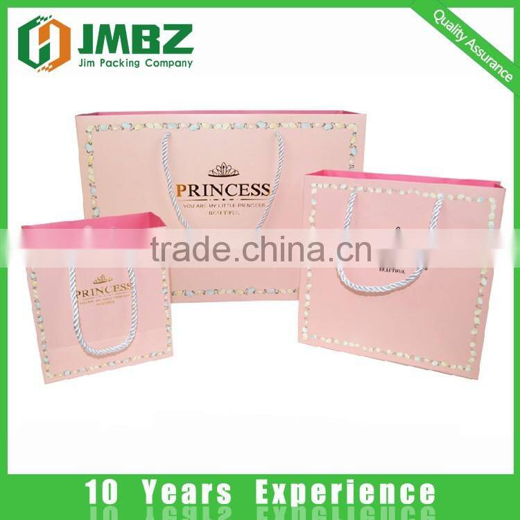 Custom made design and logo printed shopping paper bags with handles