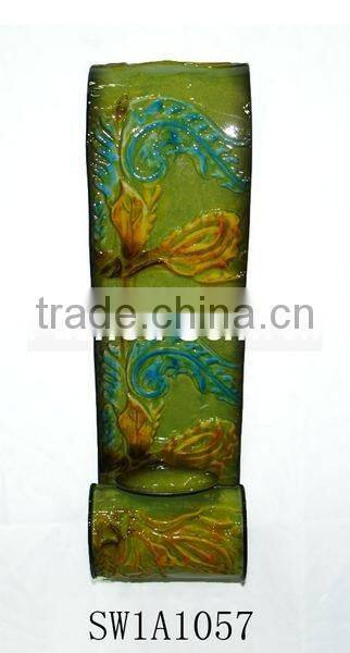 Floral embossed iron candle holder