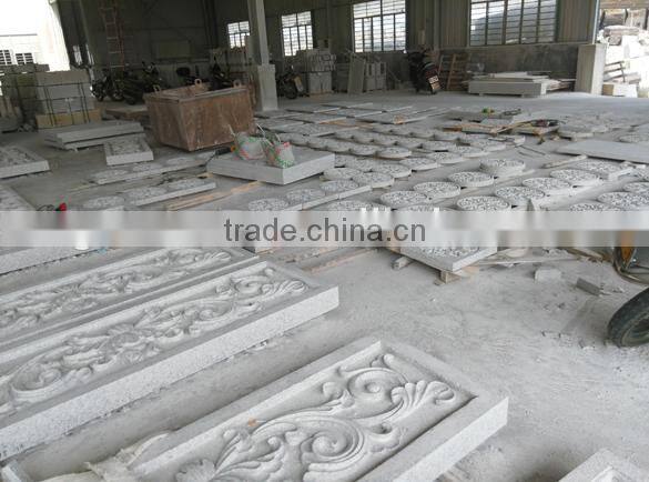 carved stone wall decoration