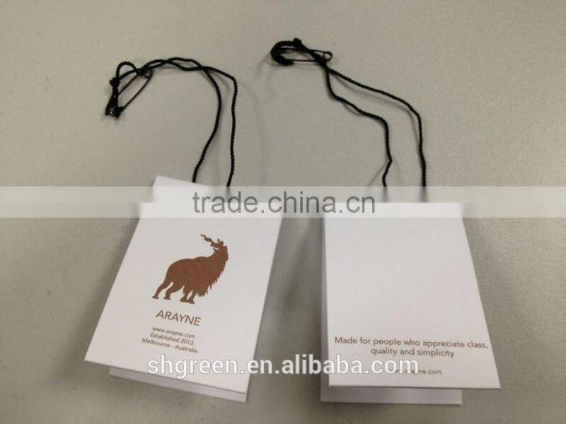 Center fold paper hangtag with plastic string tags for jeans denim