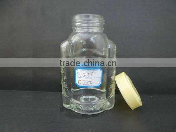 clear storage jar for honey, empty glass bottle