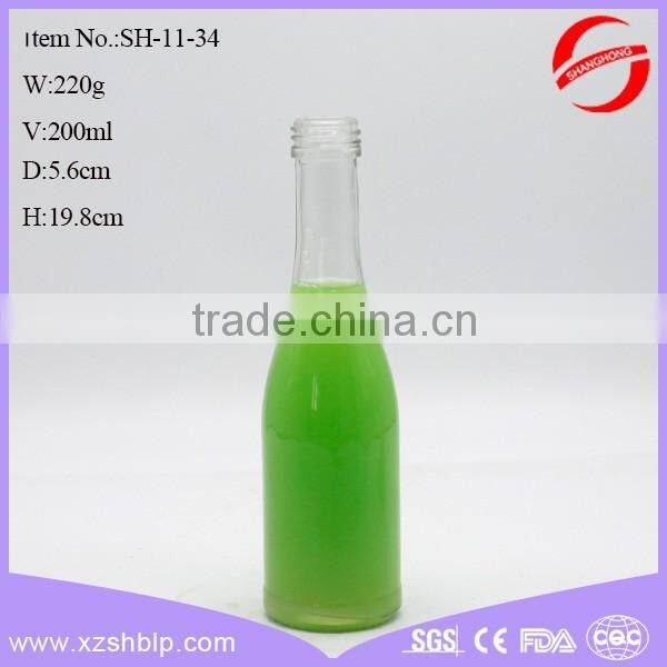 Factory price elegant glass bottle for juice with lid wholesale