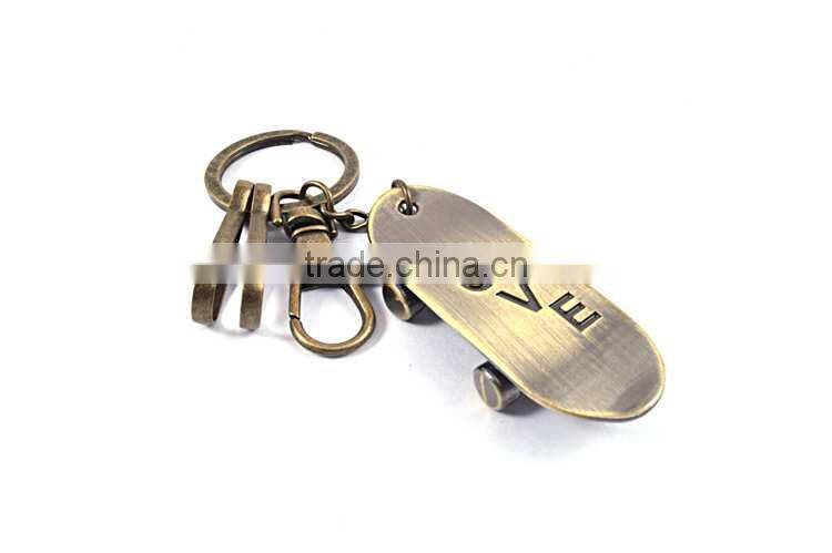 Factory oem custom logo skateboard alloy metal keychain models