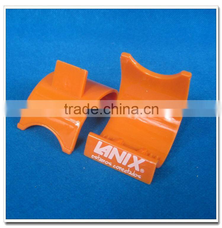 Mini universal desktop cell phone holder