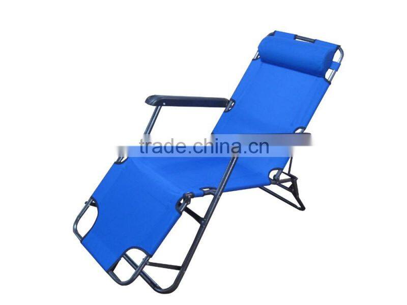 Folding lounge with foot rest and pillow