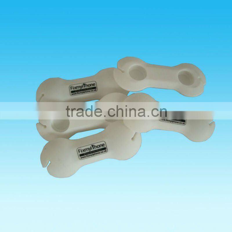 wholesale dog bone earphone soft silicone cable tidy