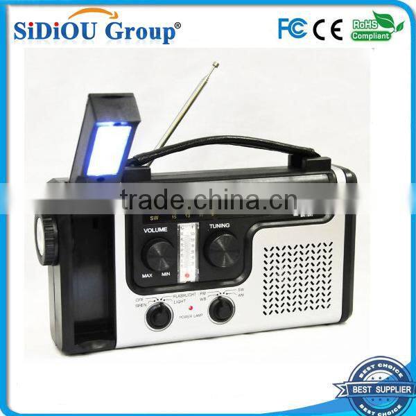 solar charger manual dynamo fm radio with led flashlight