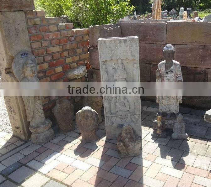 antique statue on stone