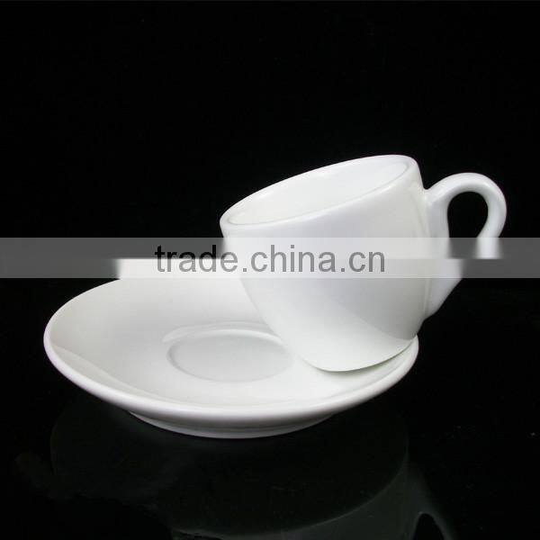 white porcelain cappuccino coffee cup and saucer