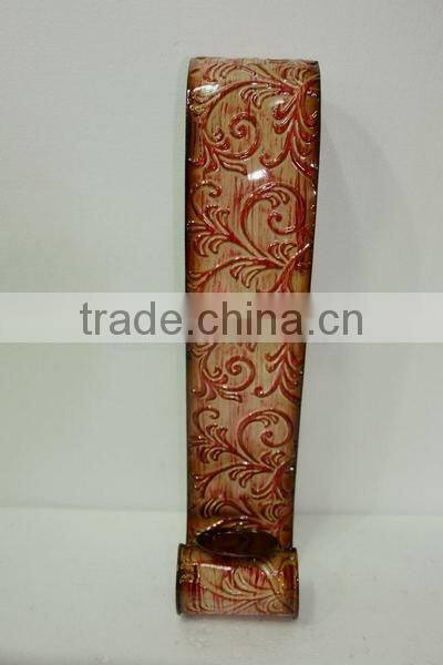 Wall- mounted iron candle holder