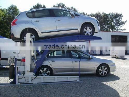 Hydraulic low ceiling tilting car stacking lift