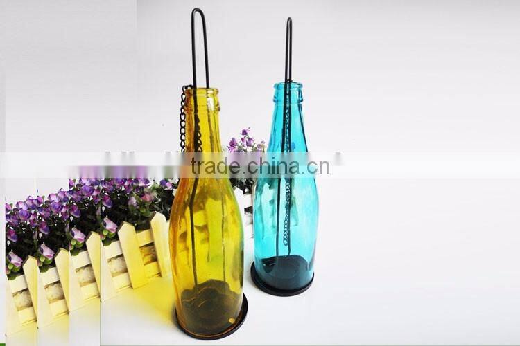 colored tea light glass candle holder with hanging metal handle