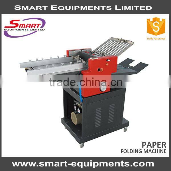 automatic folding machine, brochure folding machine, check folding machine