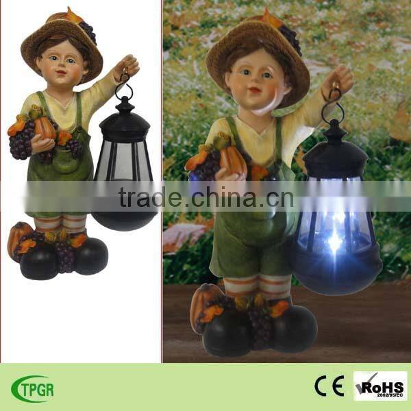 polyresin children figurine statue with hanging solar lantern for autumn harvest home decoration