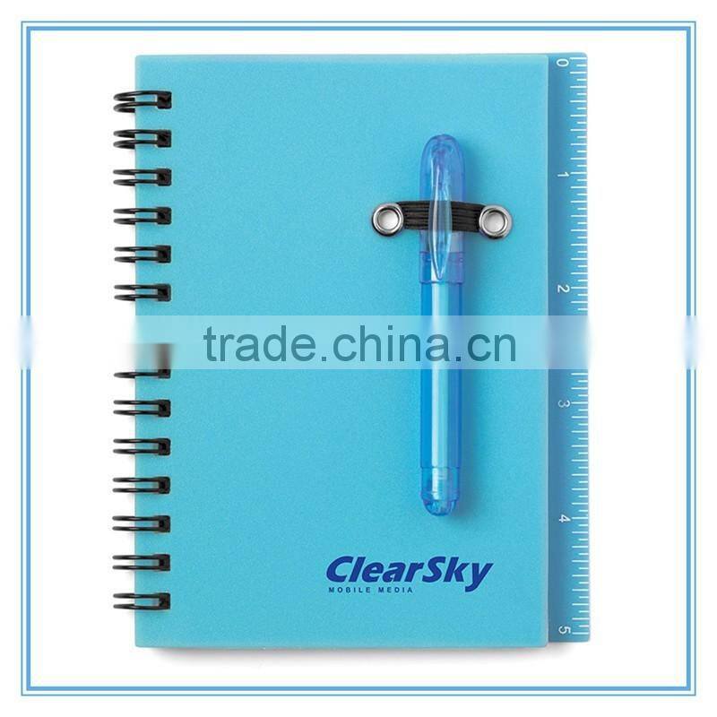 notebook with sticky note pad