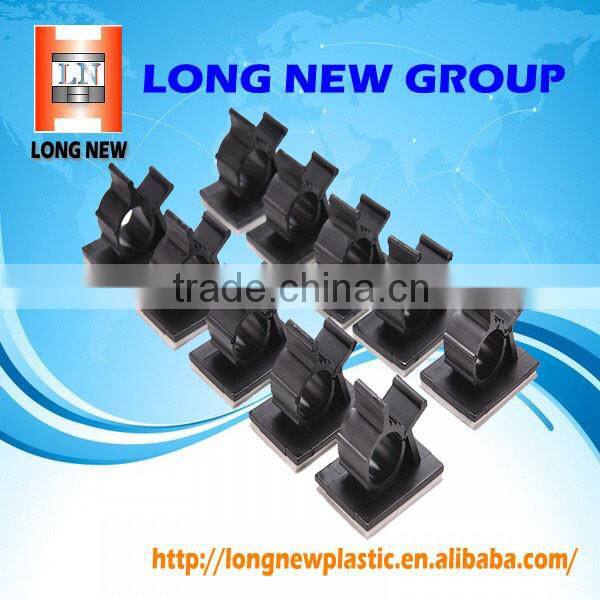 Plastic clip with adhesive injection mold for cable wire