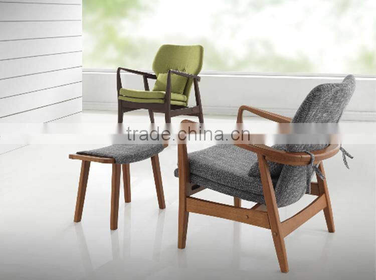 Mid-century walnut finished modern green fabric upholstered club chair with sleek polished wood arms